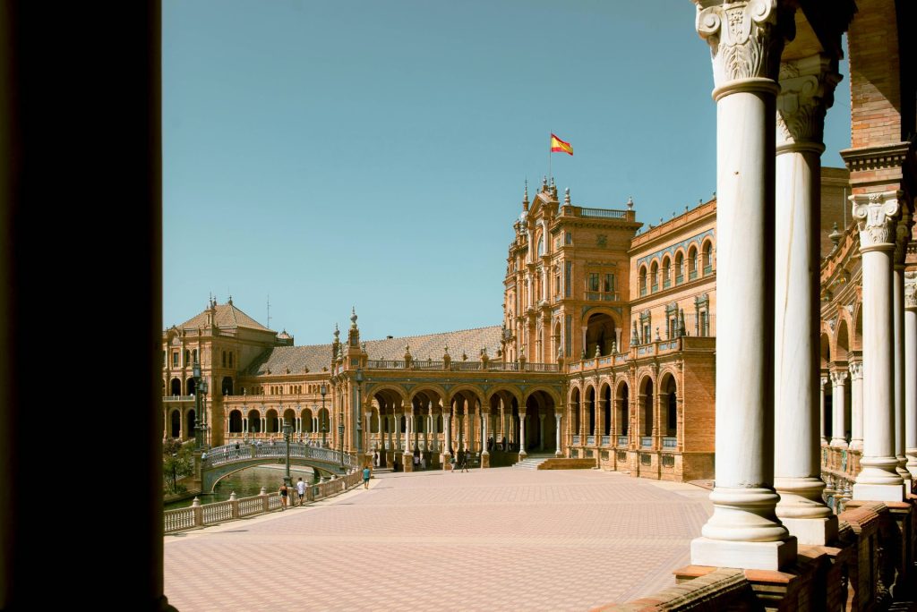 Elegant spanish architecture under a bright blue sky.